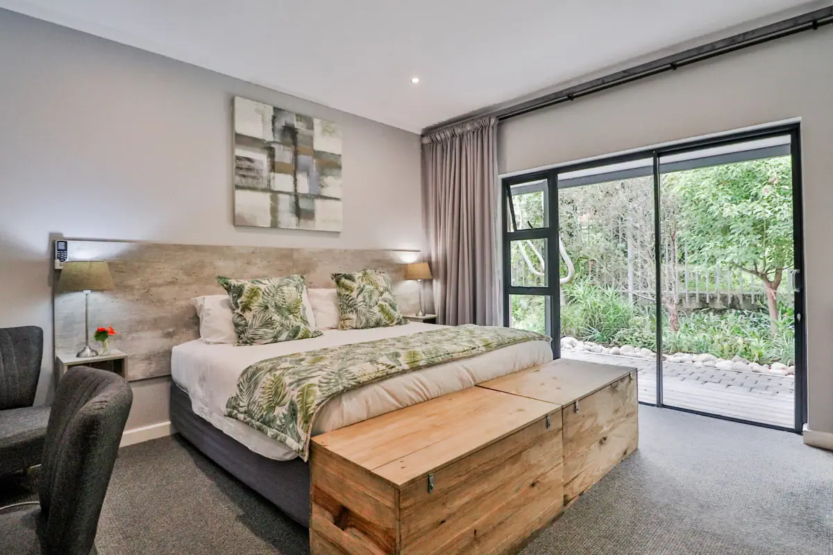 The room with two beds with view to the patio