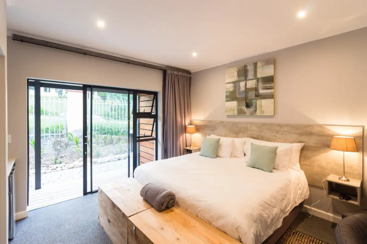 The room with two beds with view to the patio